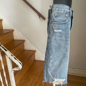 Denim distressed jeans free people shorts, mid thigh on me. Never worn,